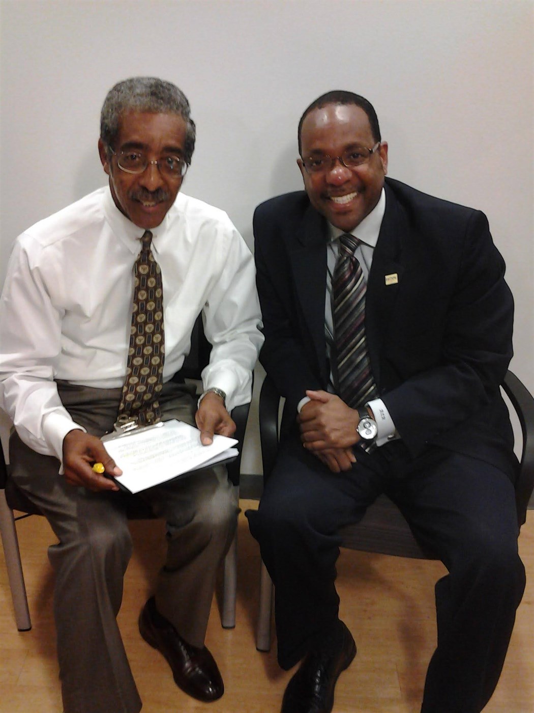 Ronald C. Rice seated with his father, New Jersey State Senator Ronald L. Rice